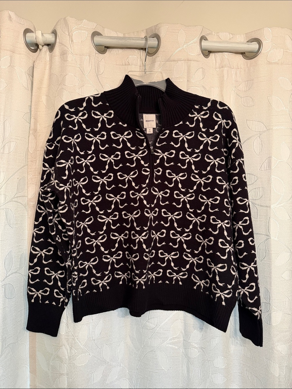 Maeve Black Sweater with White Bow Pattern